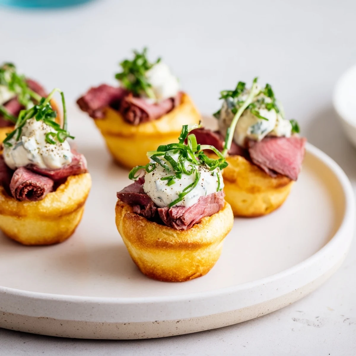 Elegant Express Holiday Yorkshire Pudding Bites: miniature, delicious treats with roast beef, ready to serve warm.