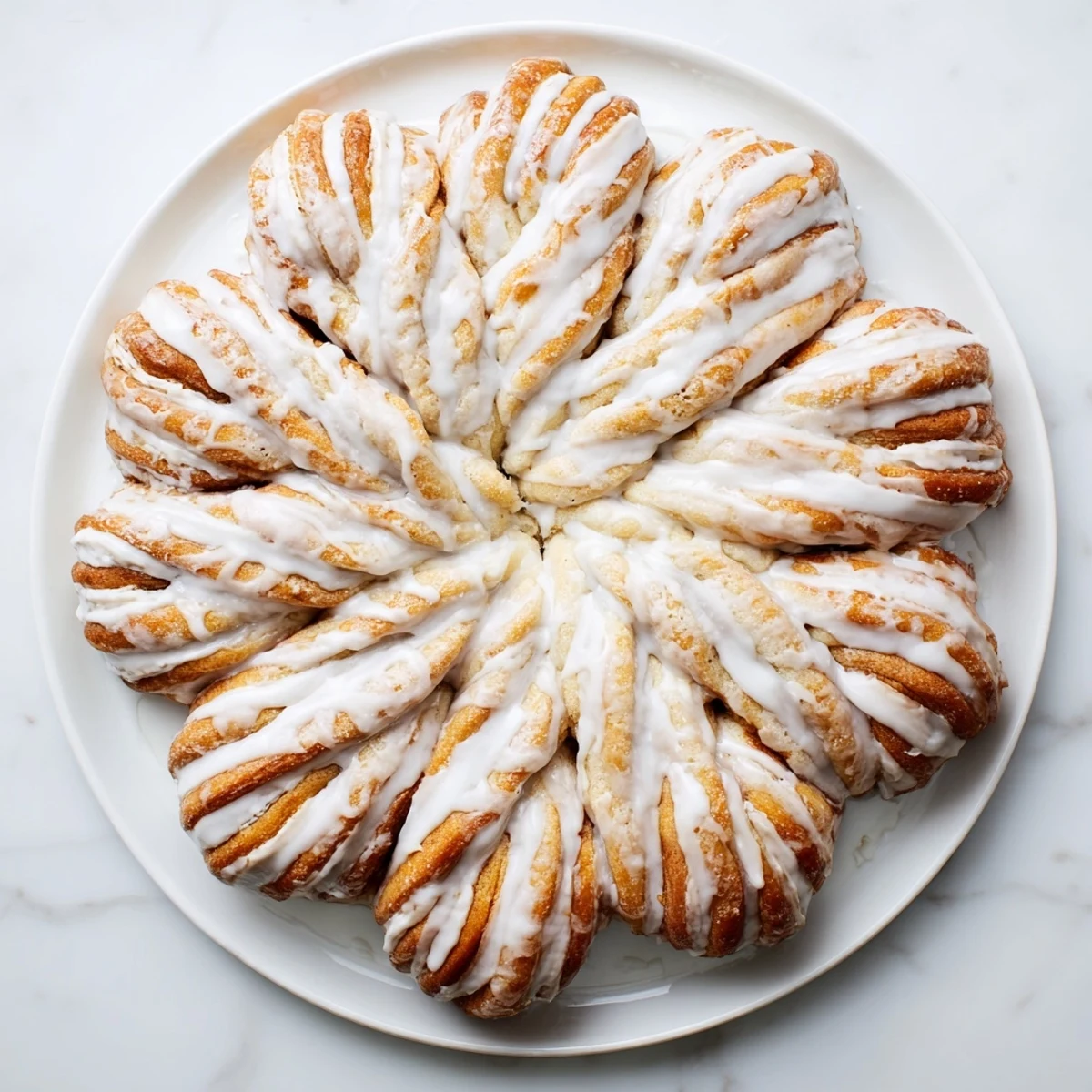 Warm, cinnamon-filled Giant Snowflake Sweet Rolls arranged perfectly on a holiday breakfast table.