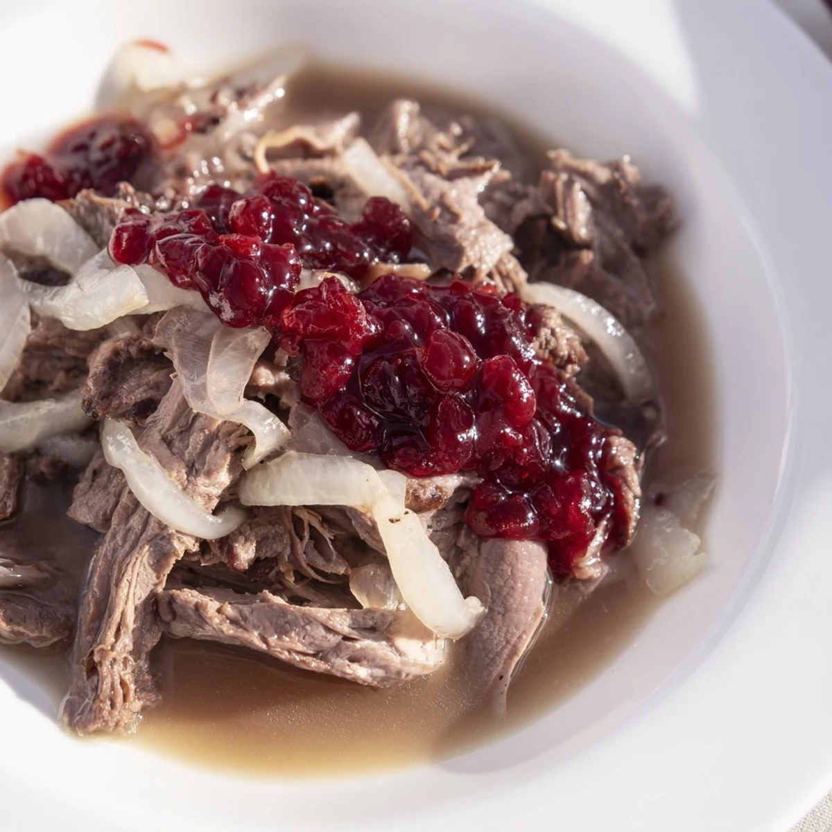 Imagine steaming Finnish Reindeer Stew; warm, rich, and aromatic, topped with bright red lingonberries.