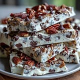 Creamy cottage cheese cookie dough Greek yogurt bark with mini chocolate chips, frozen for a high-protein snack.  