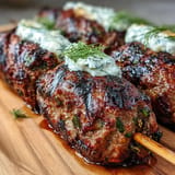 Juicy lamb kofta infused with cumin, coriander, and mint, paired with refreshing cucumber-dill tzatziki.  