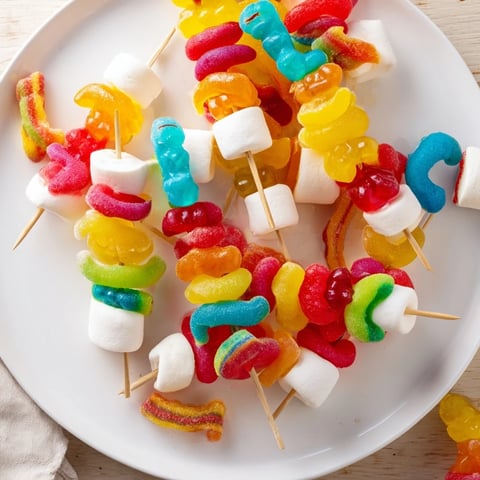 A vibrant photo of Gummy Candy Kabobs, colorful and sweet, perfect for a party snack.