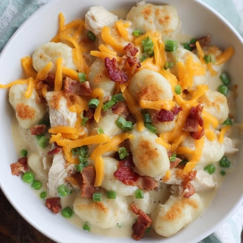 Creamy Crack Chicken Gnocchi, a comforting dinner with golden chicken, bacon, and melted cheddar, ready to savor.