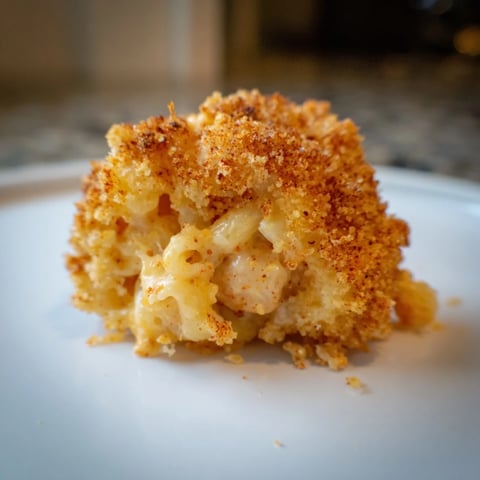 Golden, crispy Ditalini Mac and Cheese Bites, ready to enjoy with a creamy, melted cheese center.