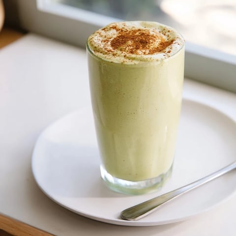 Matcha Snickerdoodle Protein Shake, a creamy blend showcasing green matcha and cinnamon's fragrant aroma.