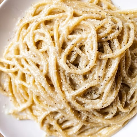Tender spaghetti coated in a rich, buttery sauce: a simple Lazy Girl Three-Ingredient Pasta quick dinner.