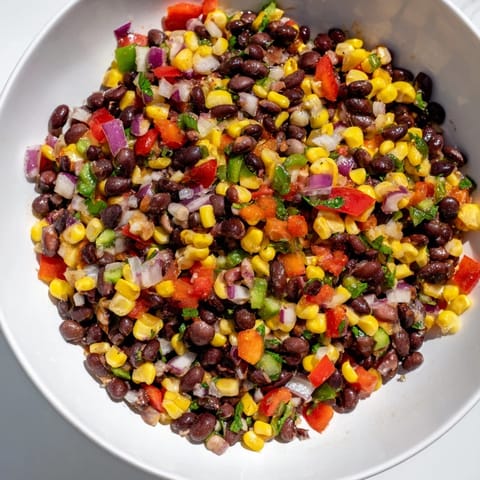 Vibrant Cowboy Caviar Salad, featuring bell peppers and a zesty lime dressing, ready to enjoy.