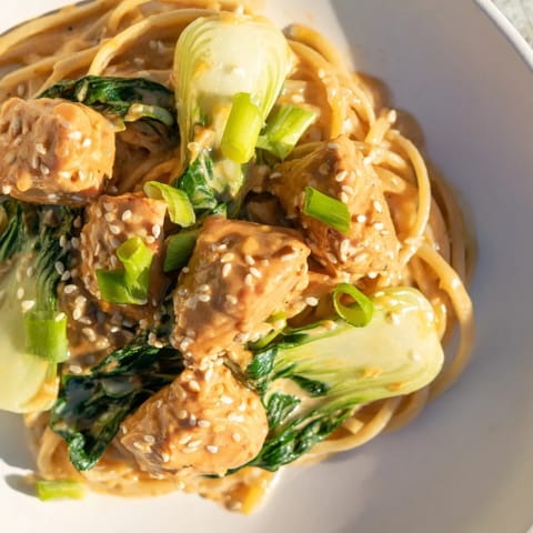 Creamy Miso Butter Salmon Pasta, imagine the rich sauce coating perfectly cooked pasta in the image.