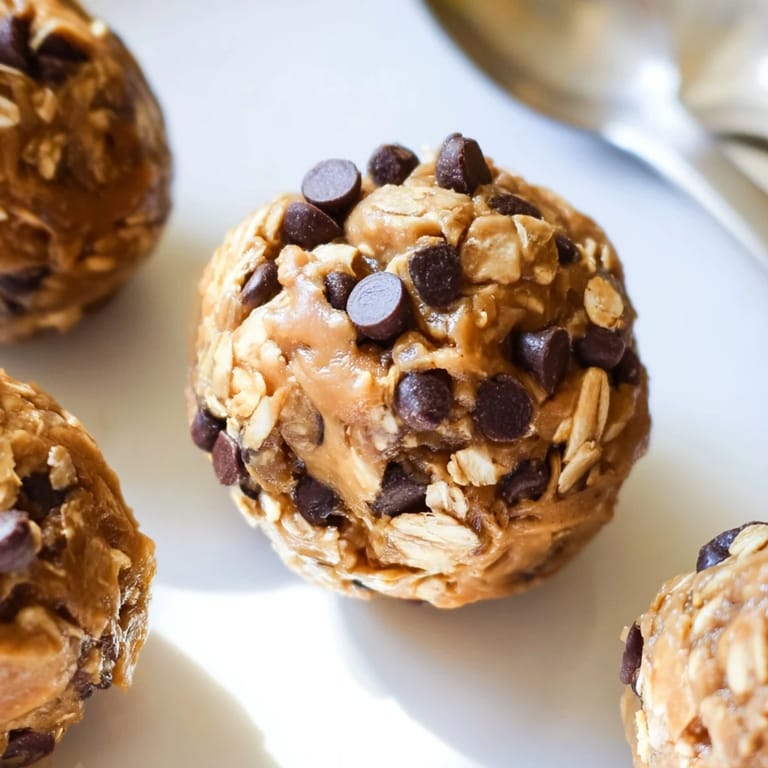 No-bake peanut butter chocolate chip energy balls, ideal for post-workout energy boosts.  
