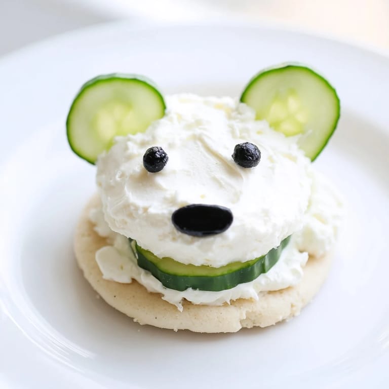 Savory Polar Bear Iceberg Cracker Stacks atop crisp crackers, a fun and easy appetizer for gatherings.