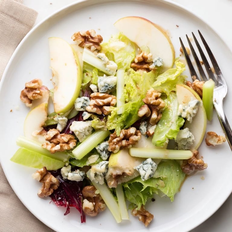 Generous serving of apple and walnut salad, ready to enjoy with family.